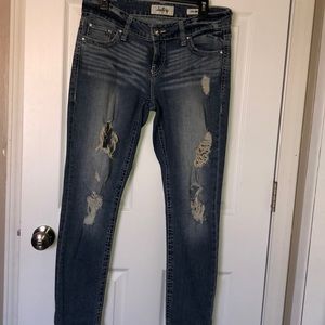 Buckle distressed jeans